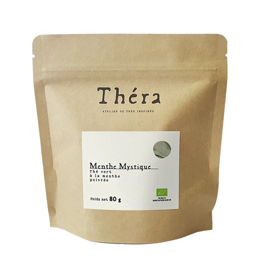 Sachet doypack vertical en papier kraft brun recyclable avec une étiquette carrée blanche et un logo "Théra"