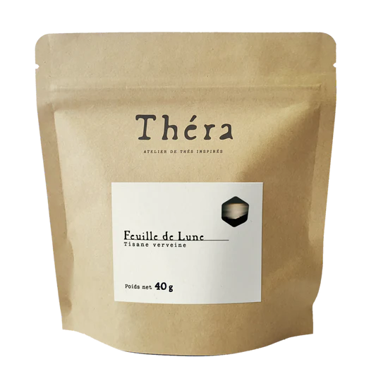 Sachet doypack vertical en papier kraft brun recyclable avec une étiquette carrée blanche et un logo "Théra"
